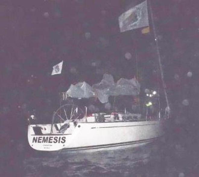 Torrential rain in Grenada as Nemesis arrives at the finish line and heads into the marina - RORC Transatlantic Race © Louay Habib / RORC